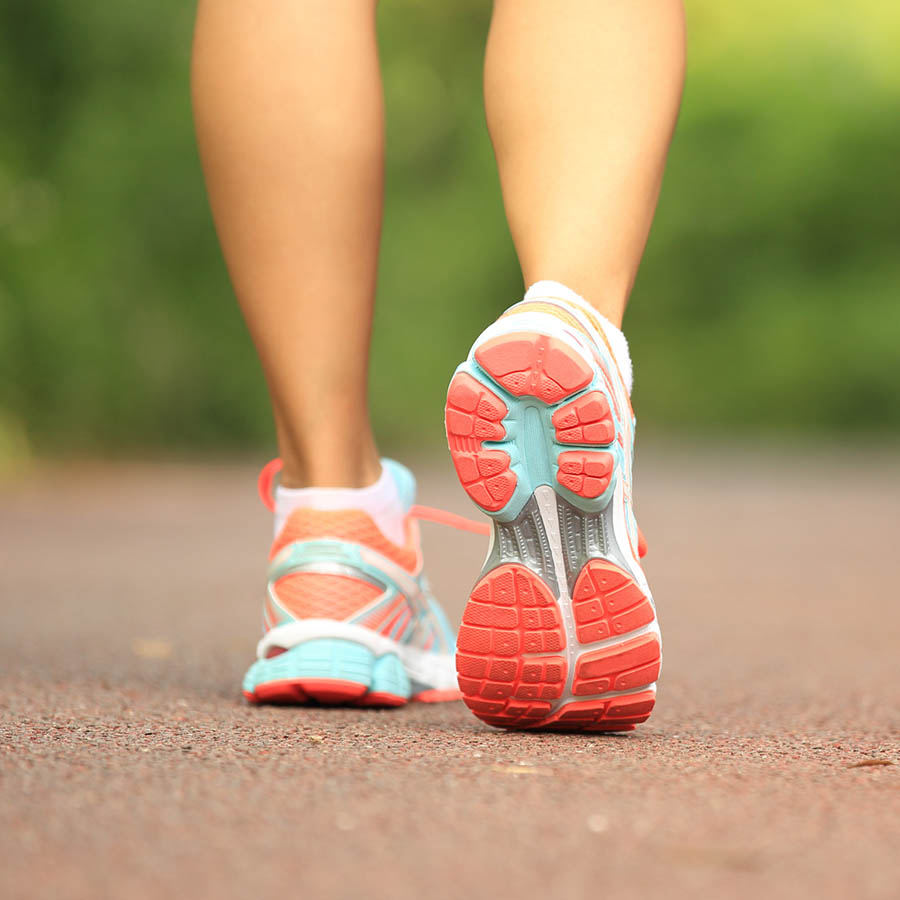 Young,Fitness,Woman,Legs,Running,At,Forest,Trail